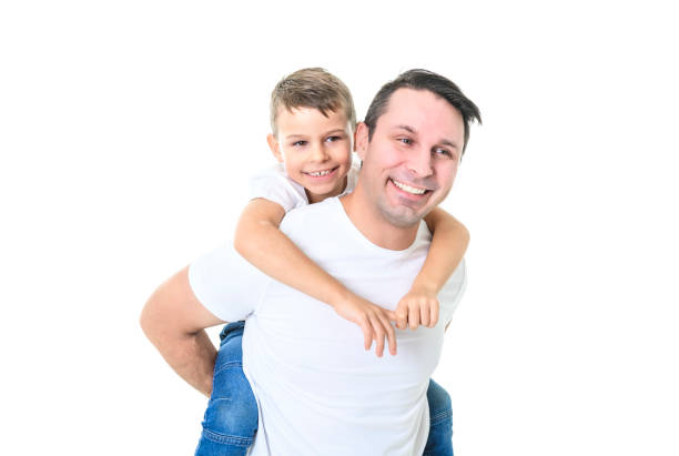 istock father with adorable little son isolated on white 1461665540