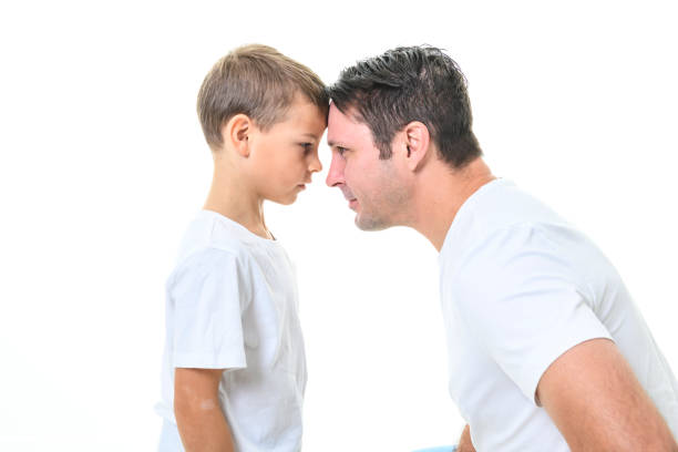 istock father with adorable little son isolated on white 1461665597