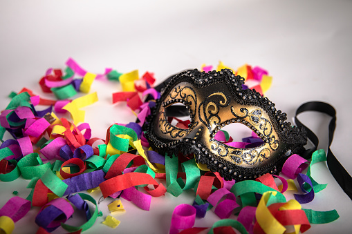 Venetian carnival mask and confetti