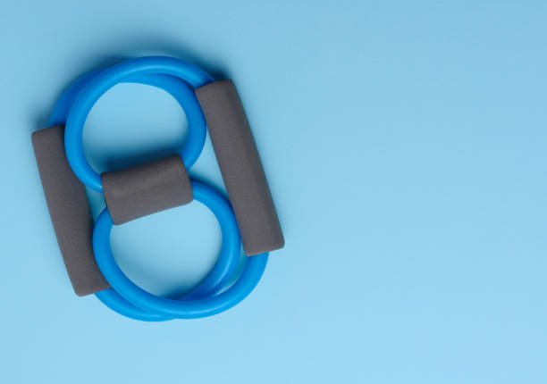 istock Rubber sports simulator expander on a blue background, top view. 1461666719