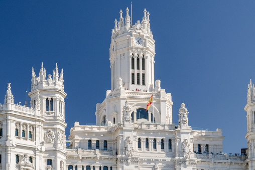 The Palacio de Cibeles is a complex made up of two white-fronted buildings located in one of the centers of historic Madrid, Spain.\nThe Cibeles fountain is a monumental fountain in the city of Madrid, located in the square of the same name, in the center of the Spanish capital.
