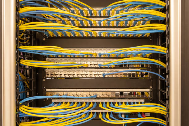 istock Tidy patched network cables, RJ45, connected to the switches and routers, data centre 1461675147