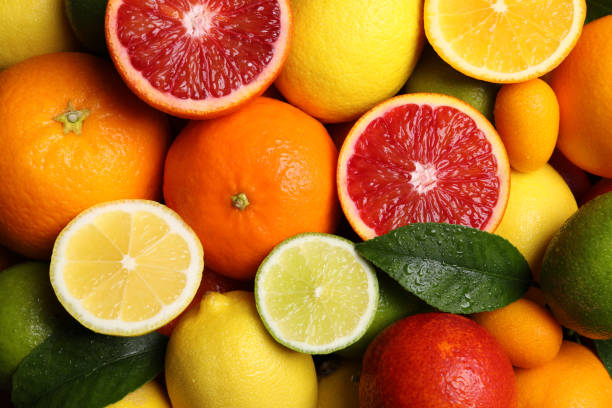 istock Different ripe citrus fruits as background, closeup 1461675201
