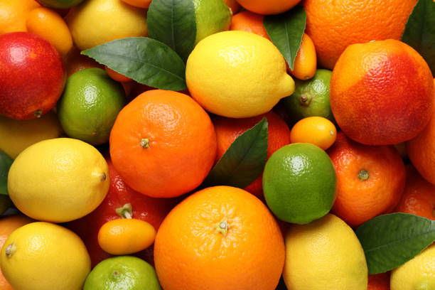 istock Different ripe citrus fruits as background, closeup 1461675215