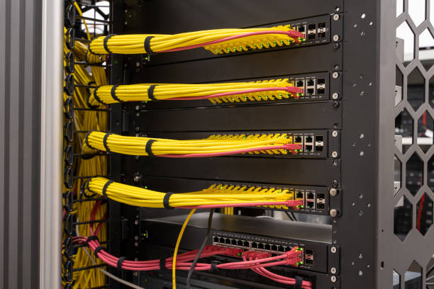 istock Tidy patched network cables, RJ45, connected to the switches and routers, data centre 1461675246