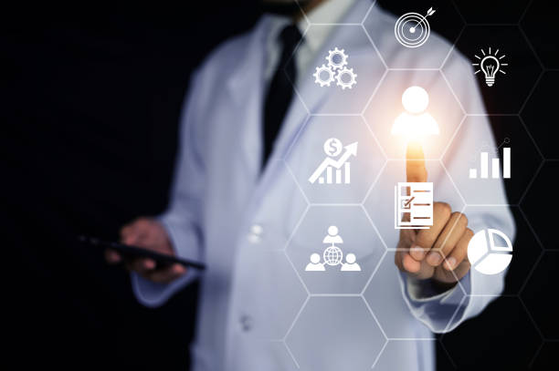 istock Businesspeople touching on screen to target customer. Target customer, buyer persona, customer behavior concept. Marketing plan and strategies. Personalization marketing, customer centric strategies. 1461675697