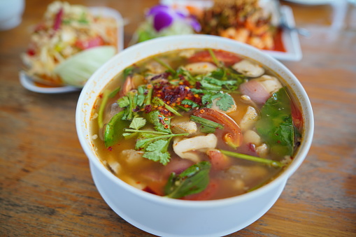 Spicy soup with pork entrails with thai food