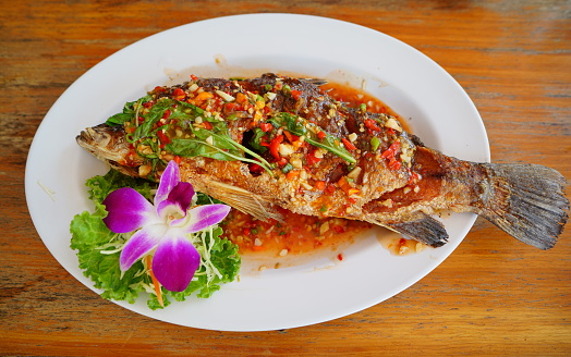 Fish served with fish sauce