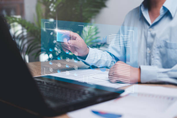 istock Business data management online and document system smart digital marketing analysis, Businessman pointing folder icon on virtual screen data management and business graph development information 1461678994
