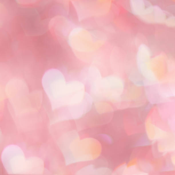 istock Defocused abstract bokeh background with pink pastel colored hearts, flare from lights, blurred bokeh holiday, celebration wallpaper. love and romance aesthetic photo, glittering lights pattern 1461681082