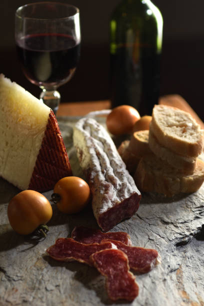 istock typical spanish food,tomato,wine,bread, cheese and sausage 1461682598