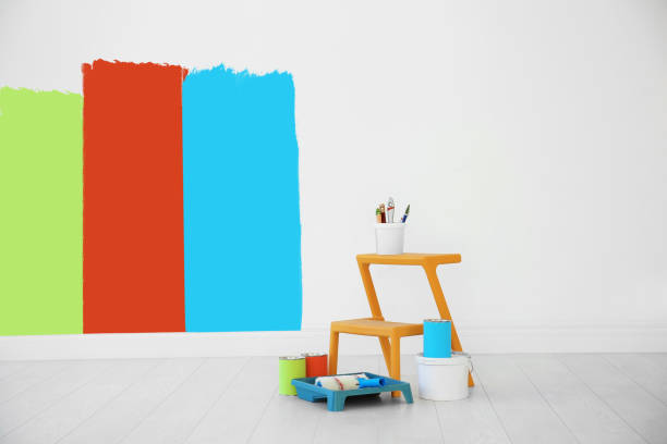 istock Set with decorator tools and paint on floor near wall 1461683089