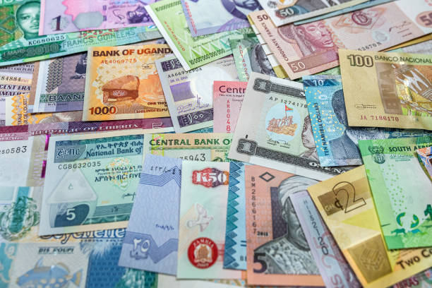 istock African money are scattered on the table so that it is completely covered. 1461685304