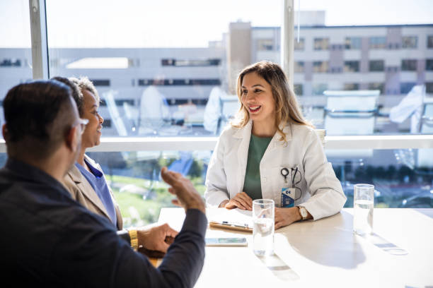 istock Unrecognizable husband gestures while talking to female doctor 1461688383