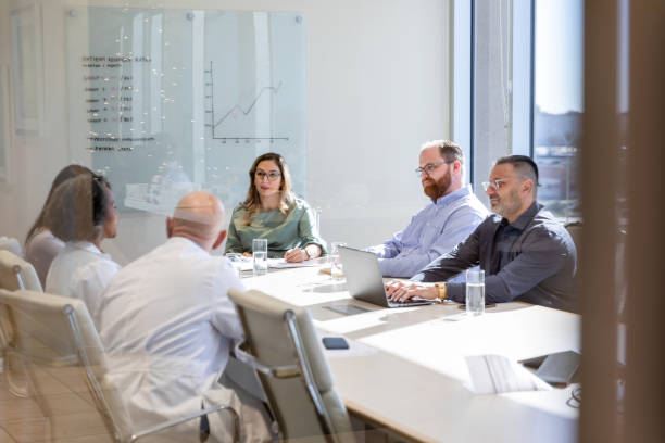 istock Diverse group of colleagues  meet 1461688649