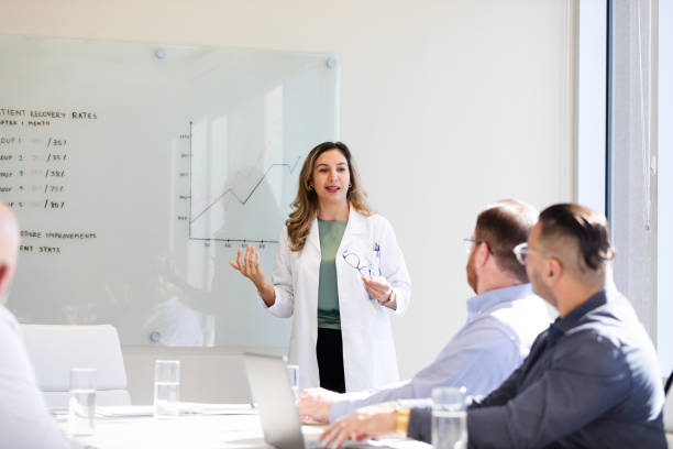 istock Female doctor gives presentation 1461688656