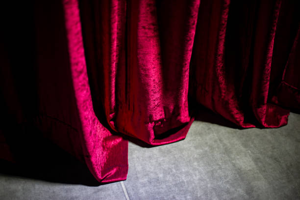 istock Red curtain of the theatrical stage. 1461694048