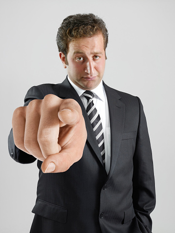 Portrait of a businessman forwarding his hand