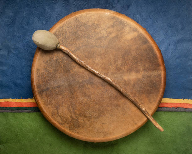 istock handmade, native American style, shaman frame drum covered by goat skin with a beater 1461752771
