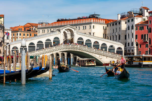 Rialto bridge and Grand canal in Venice, Italy Venice, Italy - October 2022: Rialto bridge and Grand canal in Venice grand canal venice stock pictures, royalty-free photos & images