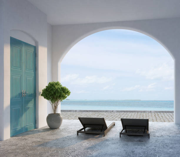 istock Santorini style architecture with sea view and sunbed.3d rendering 1461779726