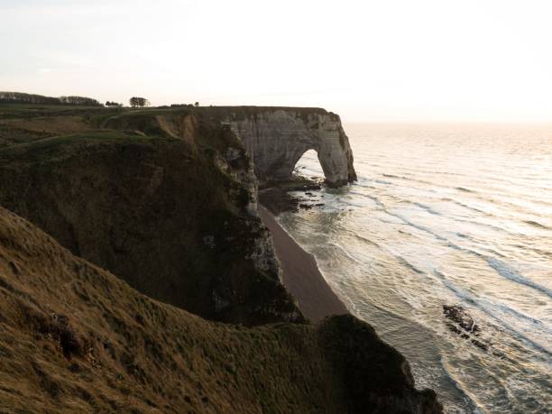 istock Panoramic view of Etretat chalk complex white cliffs natural bridge Aiguille needle atlantic ocean coast Normandy France 1461780438