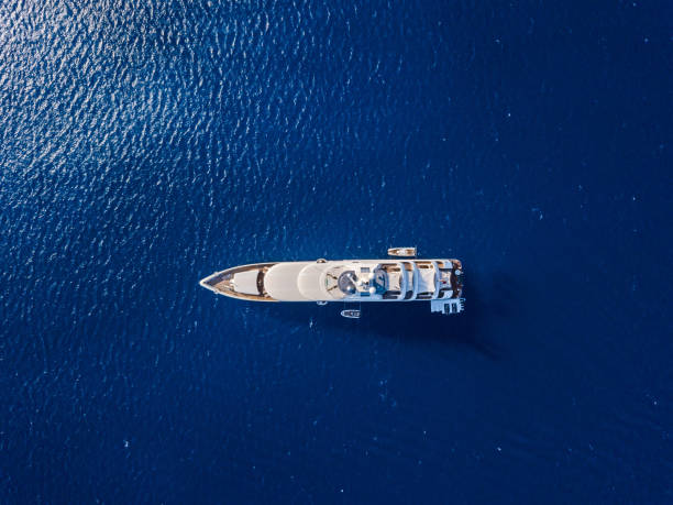 istock Aerial view on white yacht in blue sea 1461781749