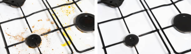 Before and after concept of a clean and dirty white gas kitchen stove. stock photo