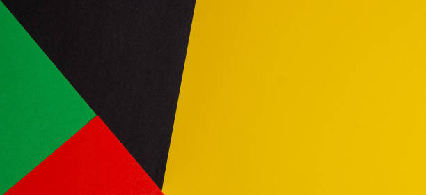 istock Abstract colored paper geometry composition banner background in black, red, yellow, green colors with copy space for text 1461787612