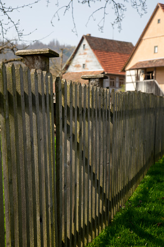 Old rural wooden garden fence
