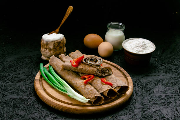 istock Pancakes. Blinks. Traditional dishes. Dark background 1461791879