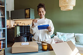 Young woman received a subscription box