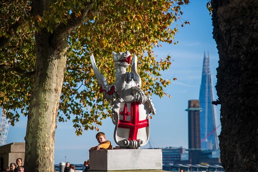 London, United Kingdom - November 12, 2022: City of London dragon with Shard and Tate Modern in the Background