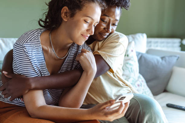 istock Young people consuming internet content on smart phone 1461800073