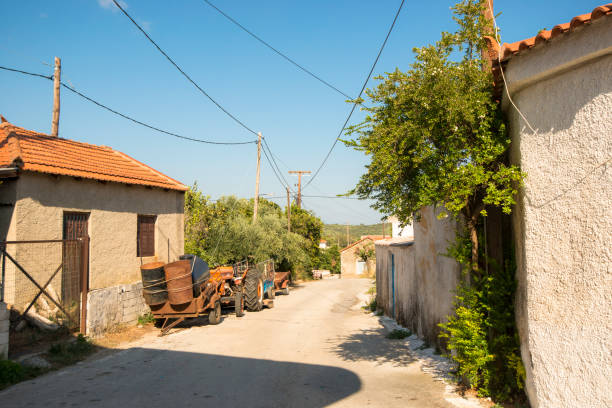 istock View on a road in Messini with a tractor 1461820993