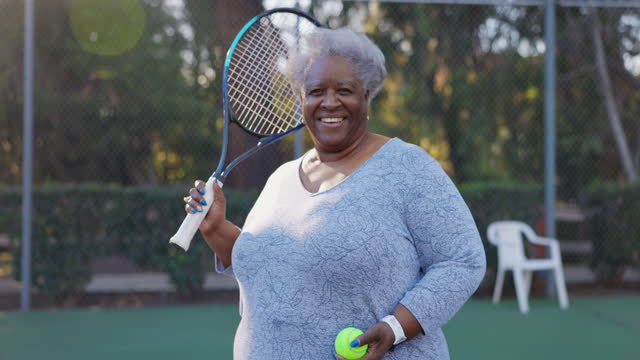 Senior Black Woman Tennis Portrait