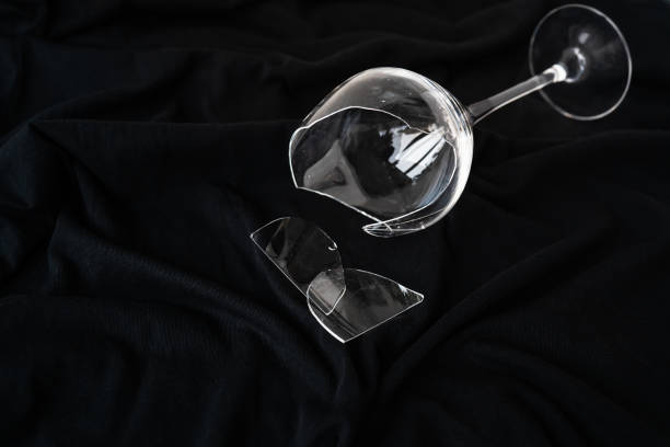broken sharp transparent glasses in dark