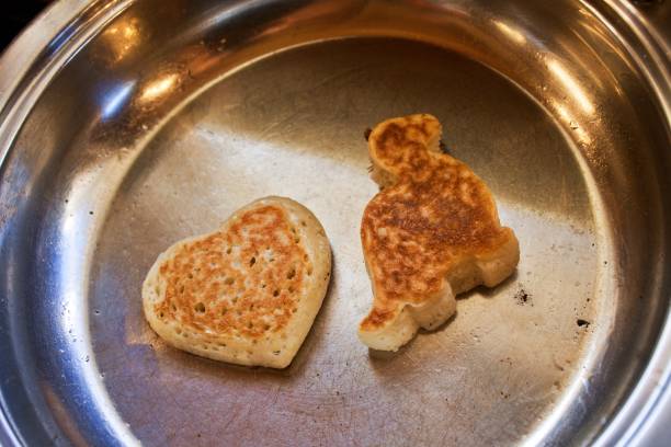 istock Homemade Shaped Crumpets in Pan 1461854929