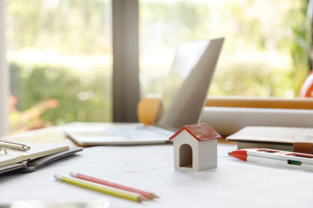 istock Engineer and Architect concept, Close up house model on Interior designer desk with blueprint 1461858473