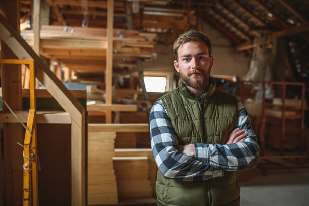 istock Caucasian Young Adult Carpenter In A Workshop 1461883284