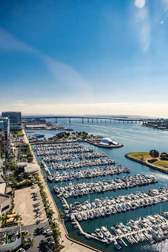 San Diego, CA - December 16, 2022: View of the Embarcadero Marina with the San Diego - Coronado Bridge in the distance.