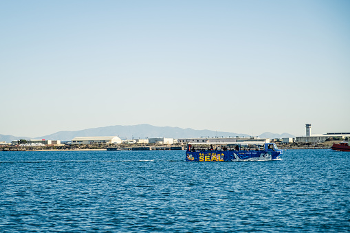 San Diego, CA - December 16, 2022: San Diego SEAL Tour bus/boat in San Diego Bay.