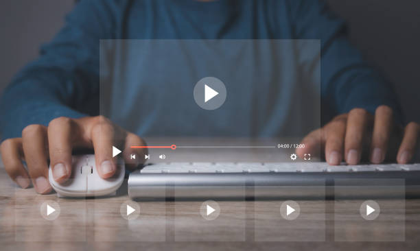 istock Man using mouse and keyboard to streaming start online live video. 1461897856