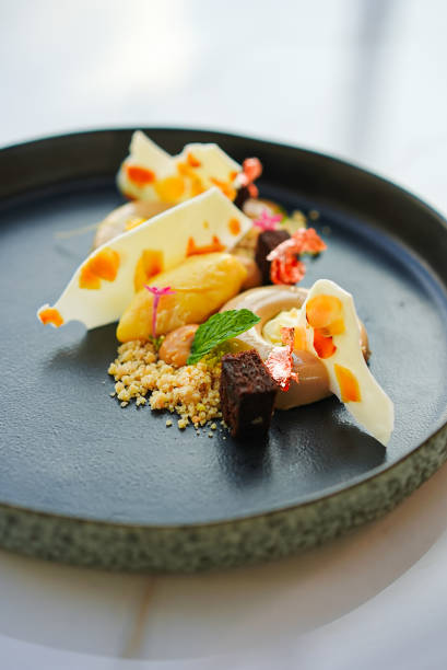 istock Sweet dessert on a dark plate 1461910736