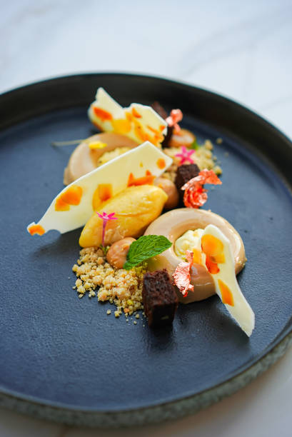 istock Sweet dessert on a dark plate 1461911292