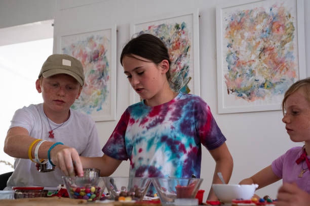 istock Children baking cookies at home 1461912015