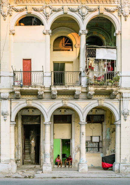 Havana, Cuba - December 12th 2022:Tourists and locals walking and enjoying relaxing time at Paseo de el Prado, one of the most touristic places in La Havana.