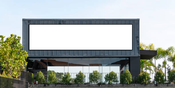 istock Mock up white background billboard on building .clipping path for Mockup 1461950856