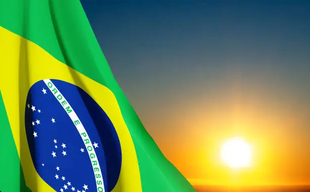 Vector illustration of Flag of Brazil against the sunset