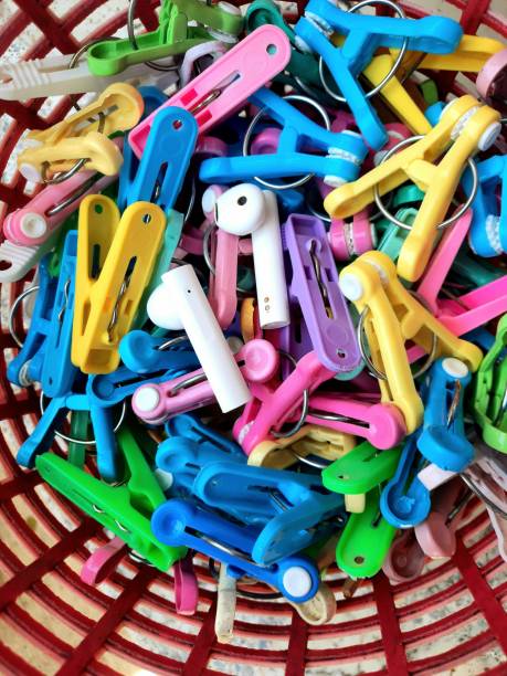 istock Wireless Headphones hiding among Clothespins. 1461979499